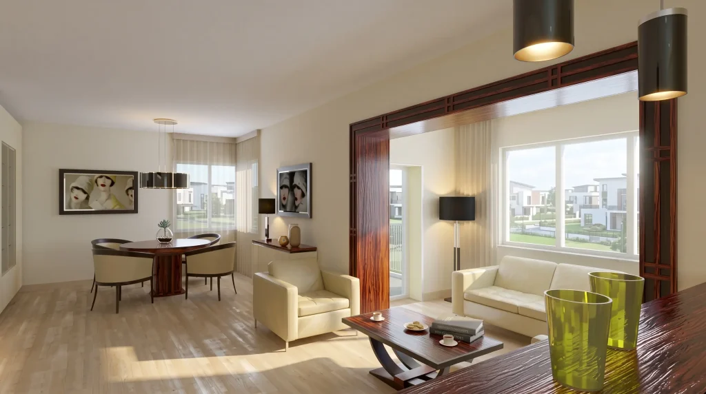 Szeroki kadr ukazujący otwartą przestrzeń luksusowego salonu art deco. Po lewej stronie jasny, elegancki fotel, po prawej fragment sofy i szklanego stolika kawowego. W tle duże okno, przez które wpada obfite światło dzienne.